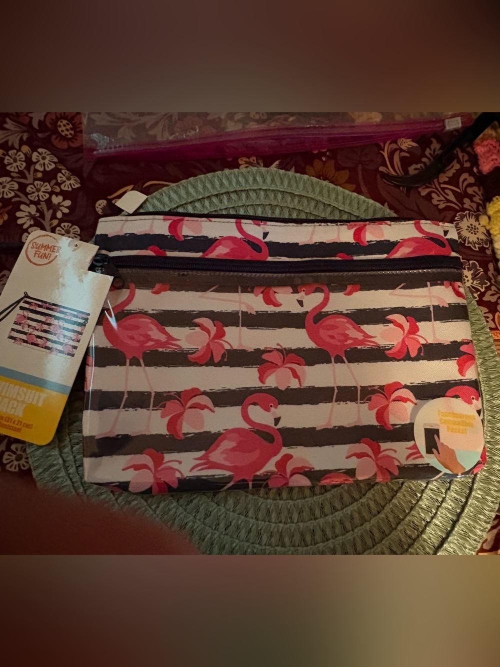 Swimsuit sack great for your wet swimsuit , zip see thru front compartment .